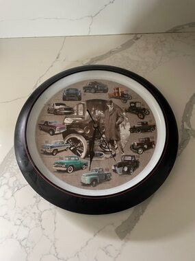 Ford Retro Automotive Wall Clock - Black Frame with Multicolor Ford Trucks